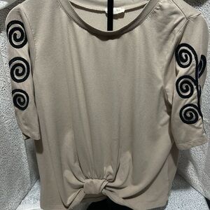 Beige Top with Black Spiral Accents